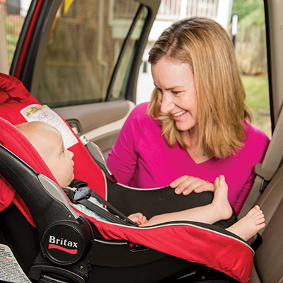 Mom and baby using the tips from the car seat guide